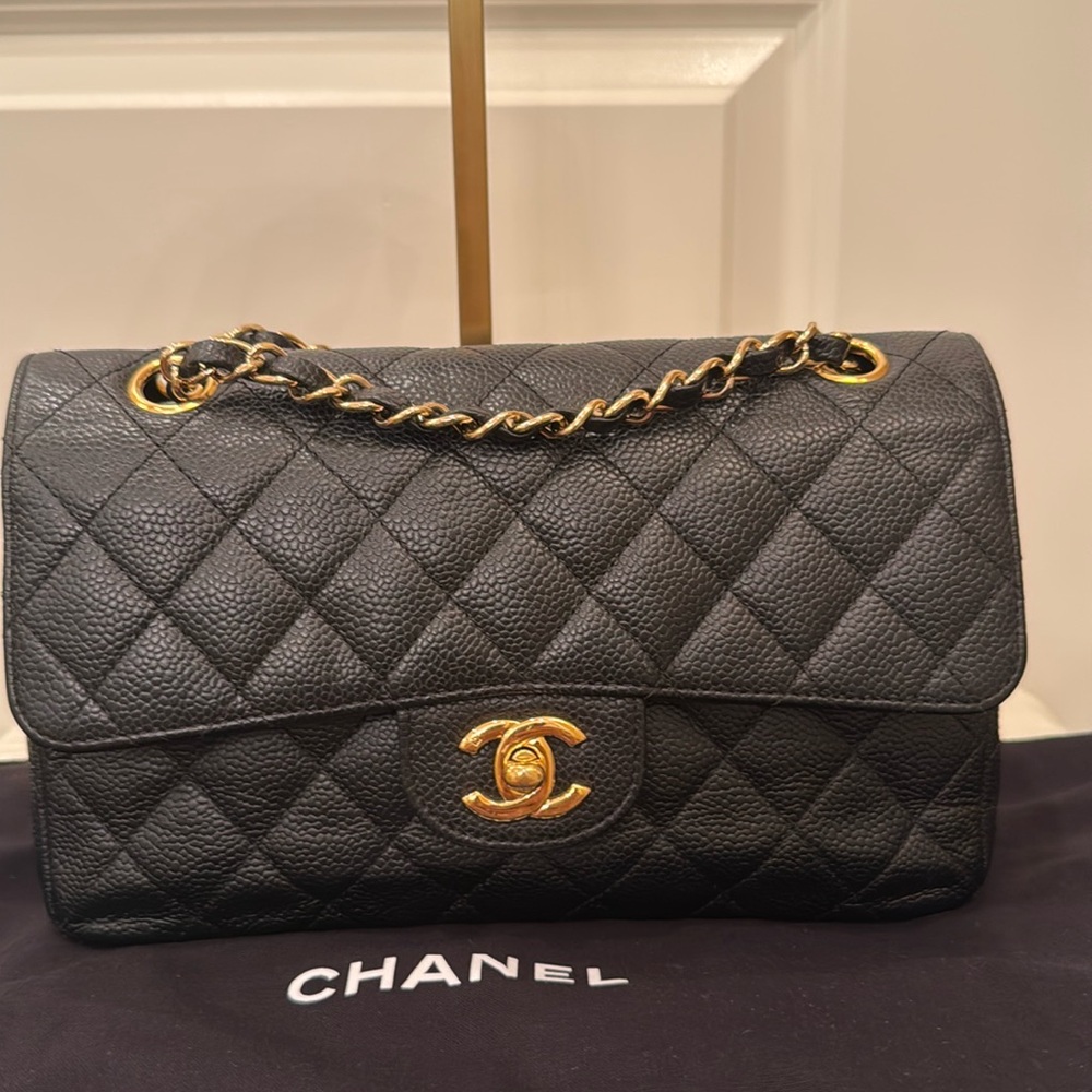 CHANEL Black Quilted Crossbody Bag with Gold Accents